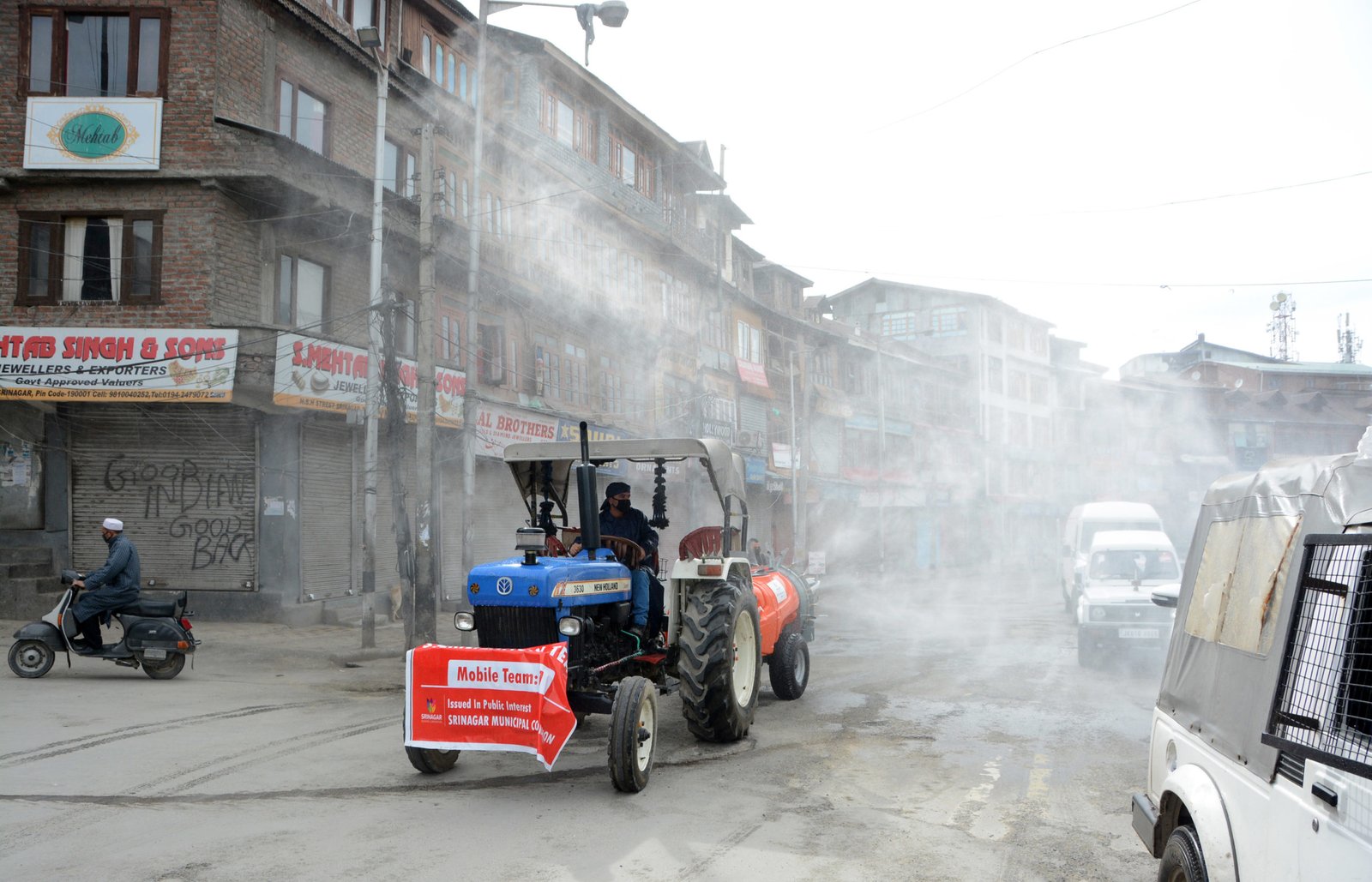 Kashmir SMC workers spray disinfectants with new robotic machines in wake of spreading of coronavirus in Srinagar Umar Ganie scaled