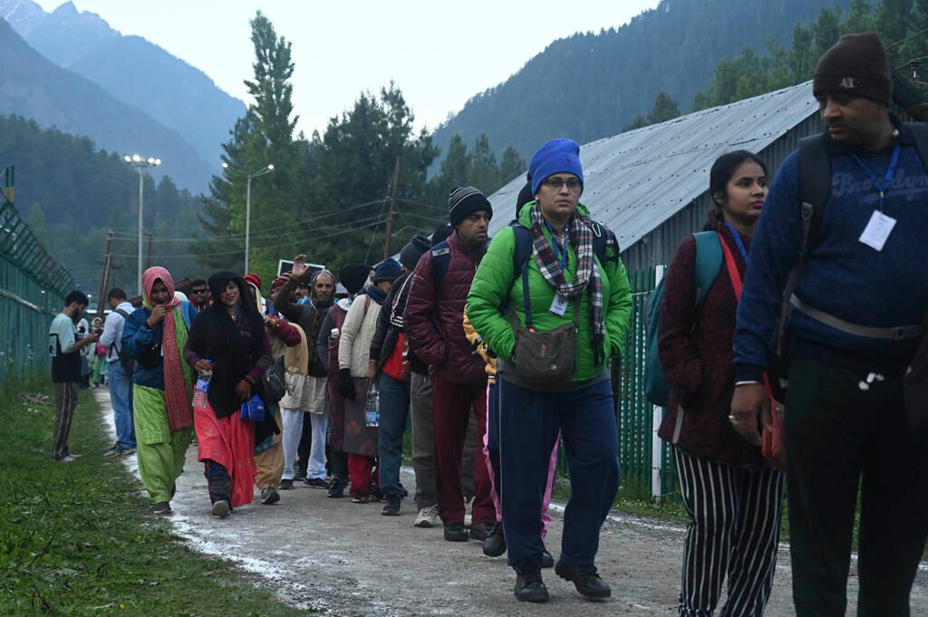 In Frames: Amarnath pilgrims leave for holy cave on first day of yatra 3 km3