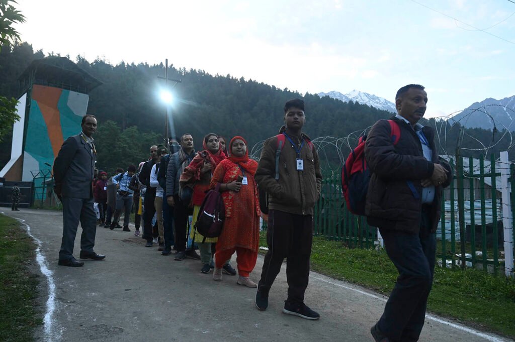 In Frames: Amarnath pilgrims leave for holy cave on first day of yatra 5 km4