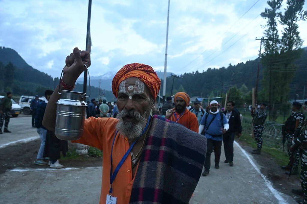 In Frames: Amarnath pilgrims leave for holy cave on first day of yatra 4 km6