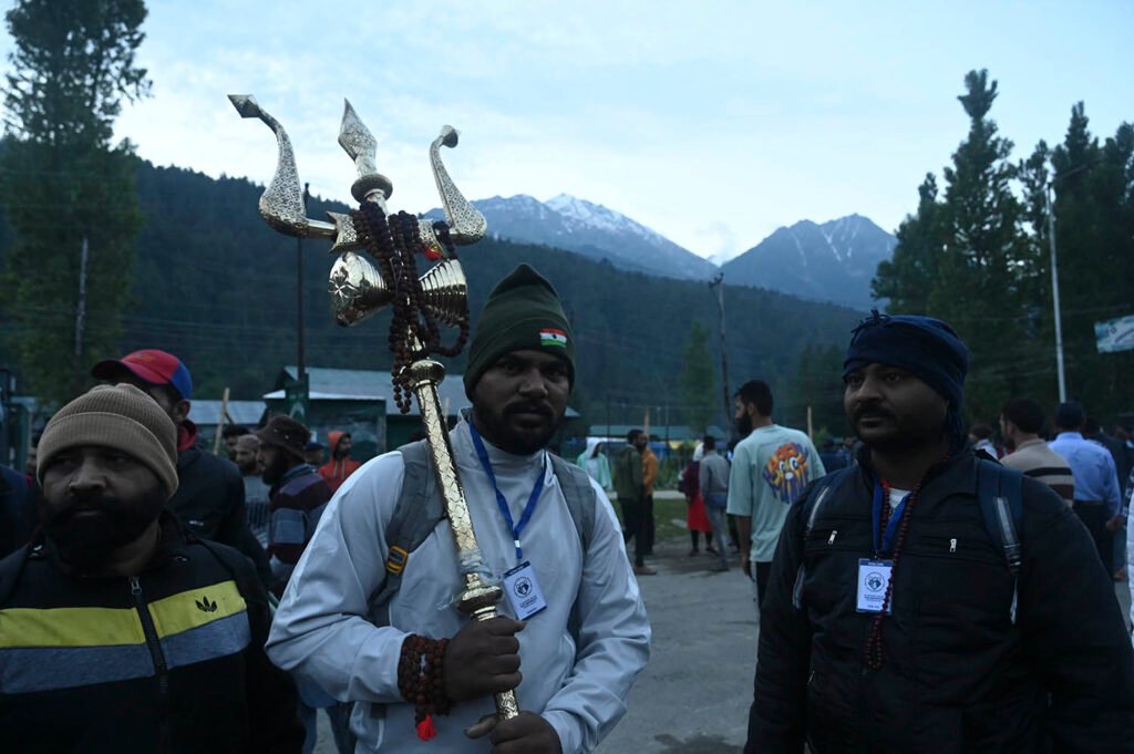 In Frames: Amarnath pilgrims leave for holy cave on first day of yatra 6 km9