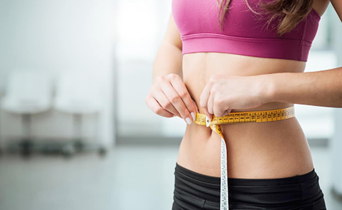 Person jogging illustrating New Year weight loss tips