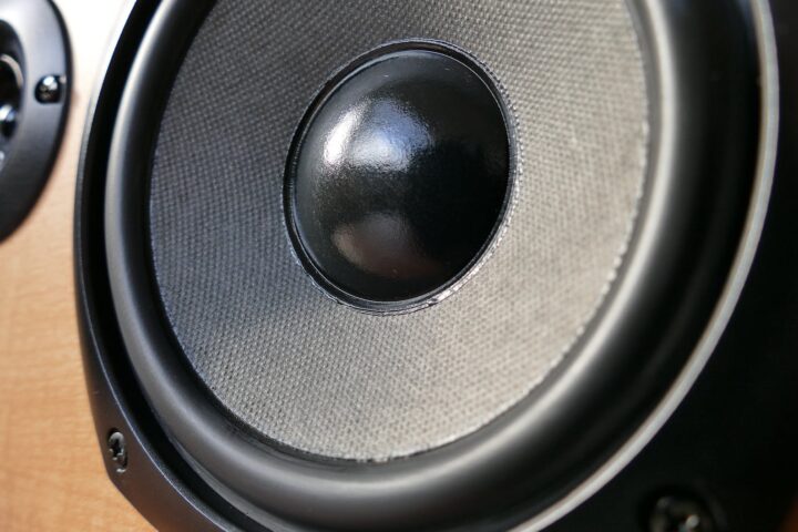 closed up photography of brown wooden framed sony speaker