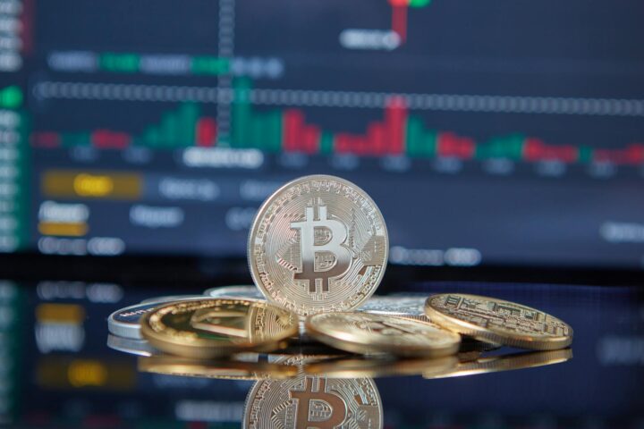shining coins with cryptocurrency symbol